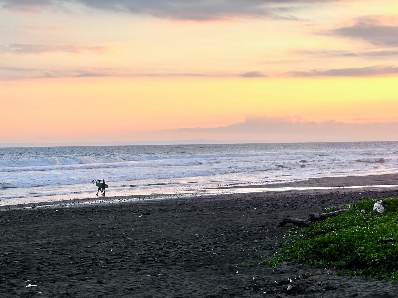 Surfing in Medewi at sunset